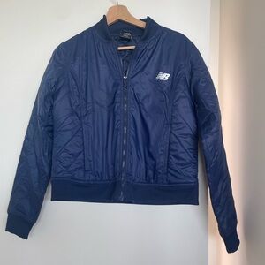 New Balance Blue Bomber Jacket with Quilted Fabric and Stand-Up Collar